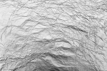 Silver crumpled foil background