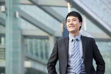 Businessman by building exterior