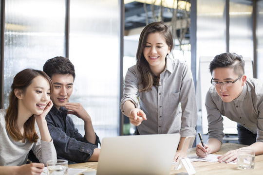 Business people having meeting in board room