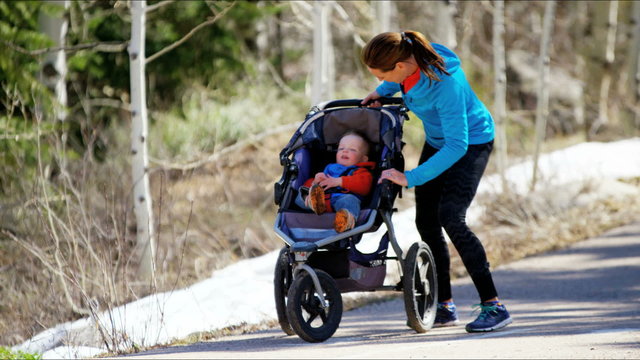 outdoor leisure Caucasian mum toddler tourism nature walk stroller childhood fun
