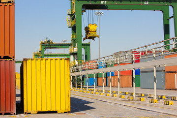 Cargo containers and cranes in shipping dock