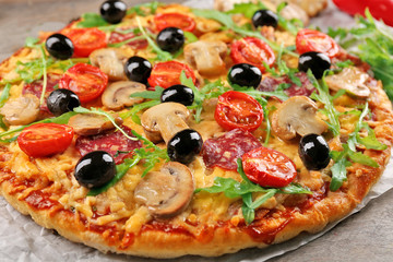 Delicious tasty pizza on table