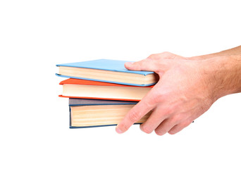 Man hands holding books, isolated on white