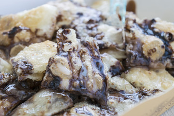 sweet roti  with sweetened condensed milk and Chocolate jam  on top