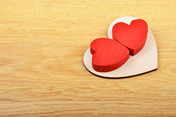 Heart on wooden background