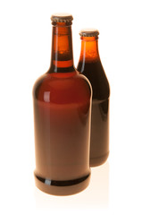 Large and Small Brown Beer Bottles On White Background