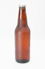 Cold Beer In Isolated Brown Beer Bottle