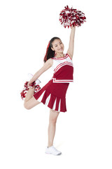 Cheerleader in action with her pom-poms