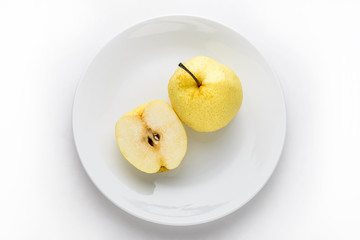 Asian pears on white plate