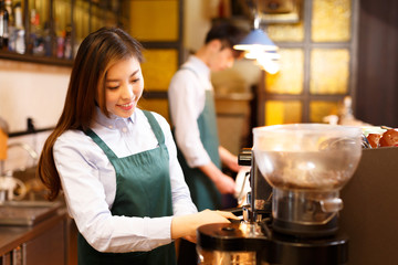 portrait waitress and waiter in cafe