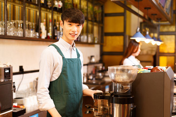 portrait waitress and waiter in cafe
