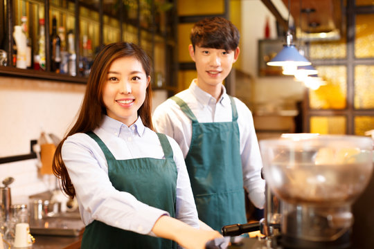 portrait waitress and waiter in cafe