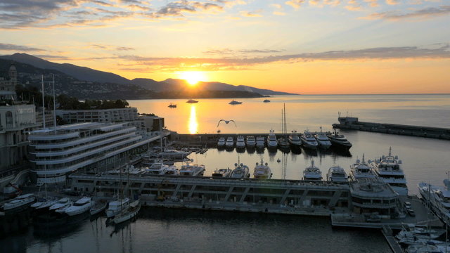 Aerial Monte Carlo sunrise Mediterranean Pier yacht marina 