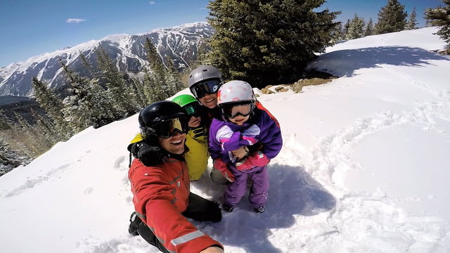 selfie portrait snow outdoor lifestyle Caucasian family travel promotion 