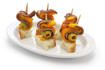 spanish tapas pinchos, anchovy olive and paprika