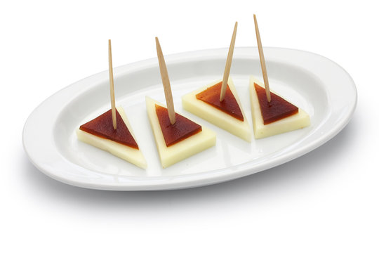 spanish tapas pinchos, machego cheese and membrillo