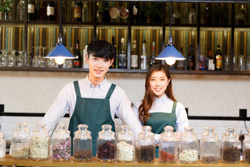 portrait waitress and waiter in cafe