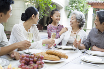 Family eating holiday meal together