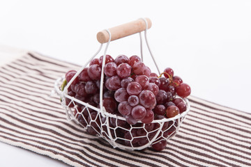 Grape in iron basket