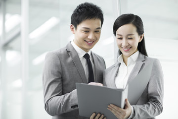 Happy business partners in discussion