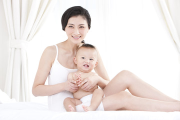 Tender moment between mother and baby