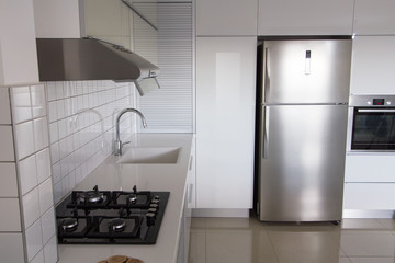 Modern white kitchen .