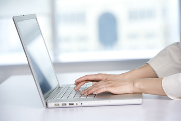 Office worker using her computer