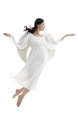 Pregnant woman wearing angel wings