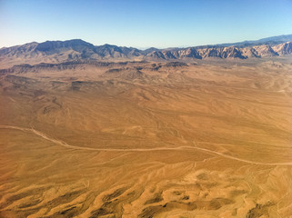 Fototapeta na wymiar Desert view from airplane.