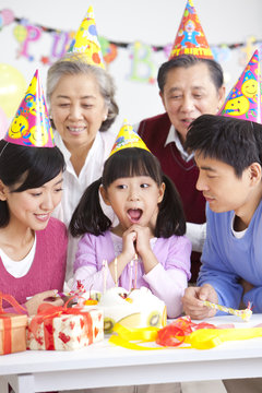 Young Chinese girl's birthday with family