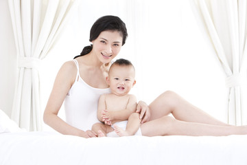 Tender moment between mother and baby