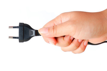 Human hand holding plug on white background