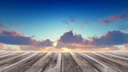 Perspective wood and sunset background