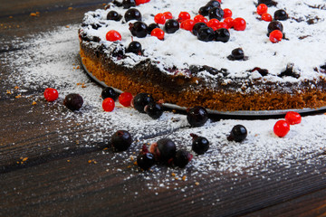 Homemade berry cake on the wood table