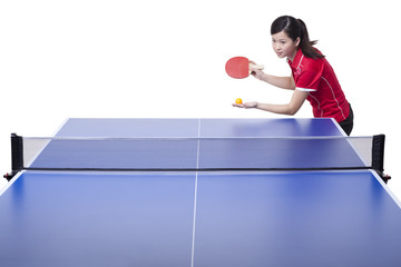 Female athlete playing table tennis 