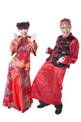 Cheerful young couple in traditional Chinese clothing
