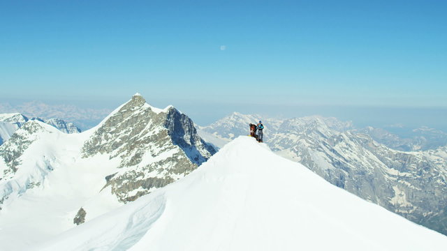 Aerial Swiss mountain Alps mountaineering snow climbers travel