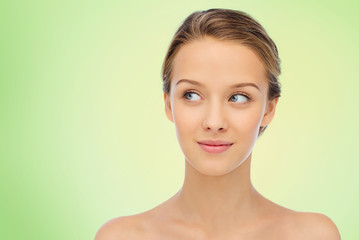 smiling young woman face and shoulders