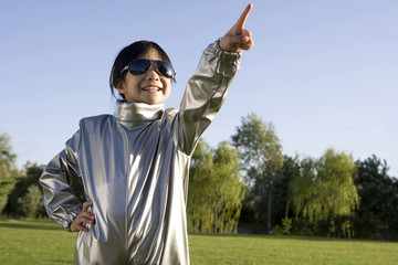 Young girl playing astronaut