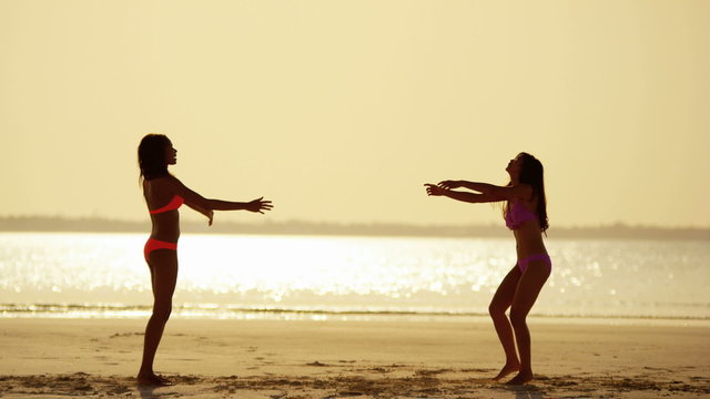 Luxury destination multi ethnic female in bikini on tropical beach 