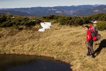 Hiker trekking in the mountains.