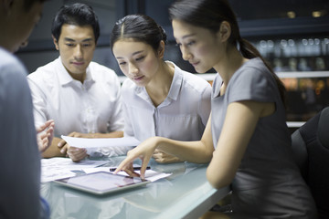 Young business people talking in meeting