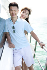 Couple Relaxing on a Yacht