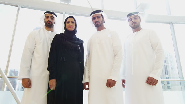 portrait business male female national dress Dubai financial real estate 