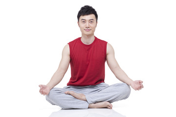 Young man doing yoga