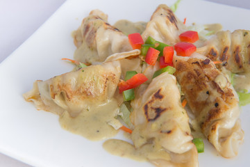 gyoza with pesto sauce