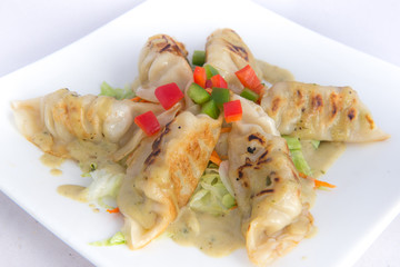gyoza with pesto sauce