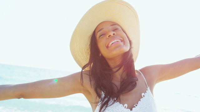 Smiling selfie of African American girl in white sundress 