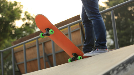 skateboarding legs at skatepark