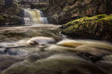 Sgydau Sychryd or The Sychryd Cascades is a set of waterfalls near Pontneddfechan, South Wales.